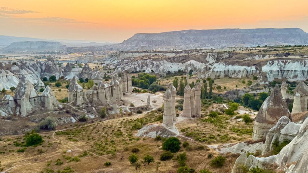 Fairy chimneys and rock formations in Cappadocia, Turkey at sunrise