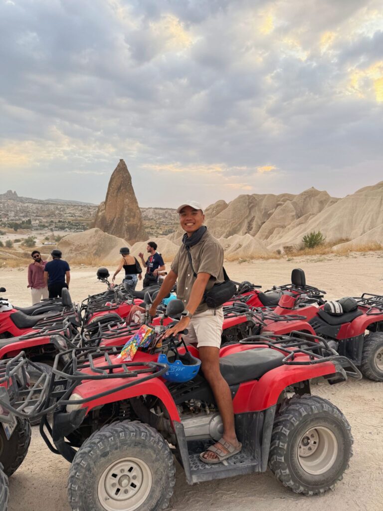 Sunset ATV ride in Cappadocia with fairy chimneys in the background