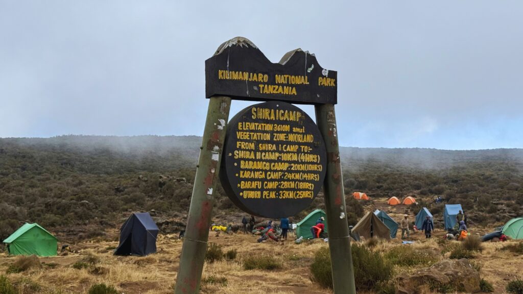 Shira Camp sign showing the camp's elevation and distances to the next camps on Kilimanjaro