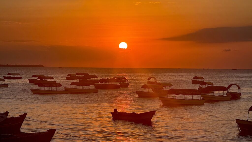 Fishing boats at sunset on Zanzibar's coast